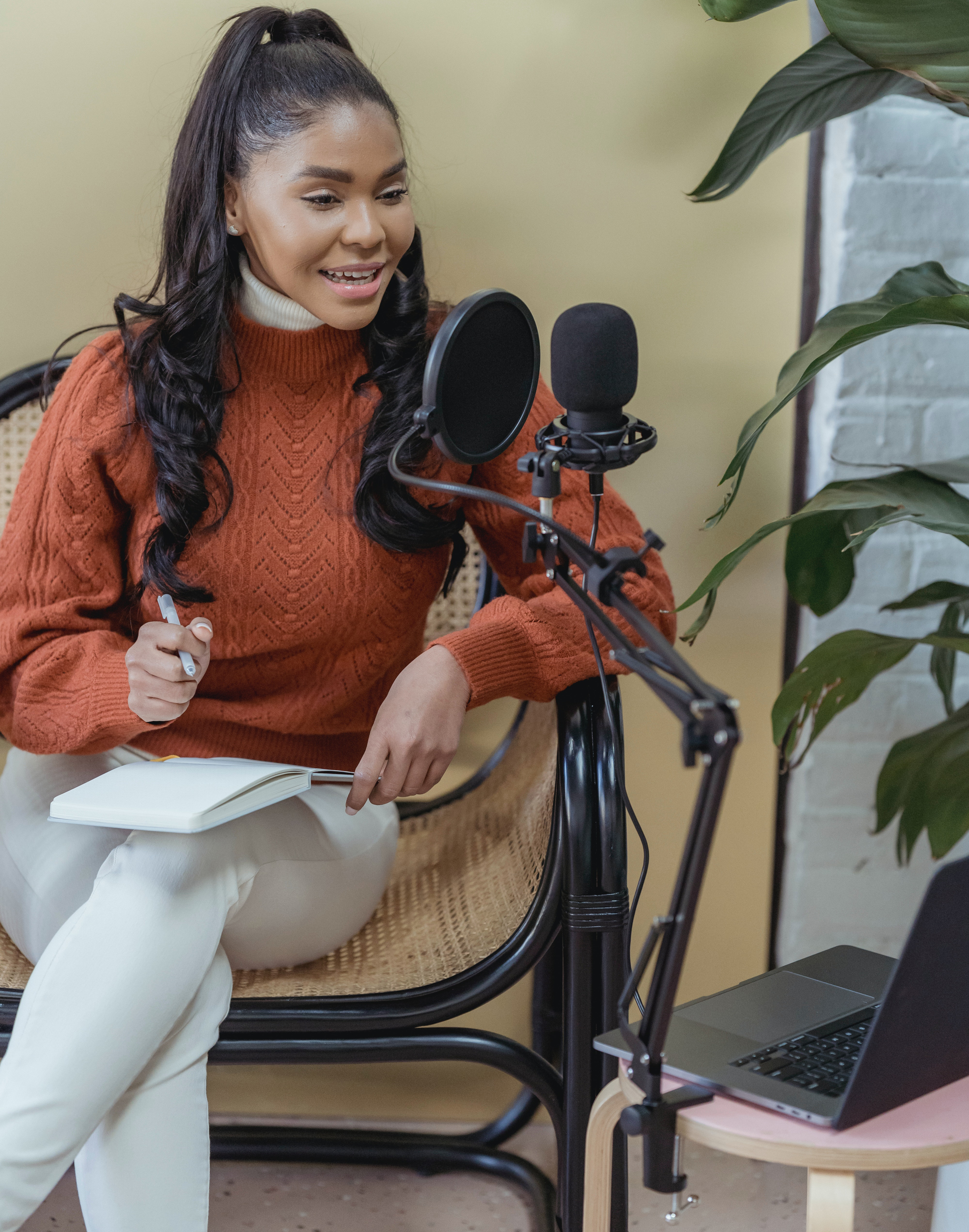 woman speaking podcast microphone